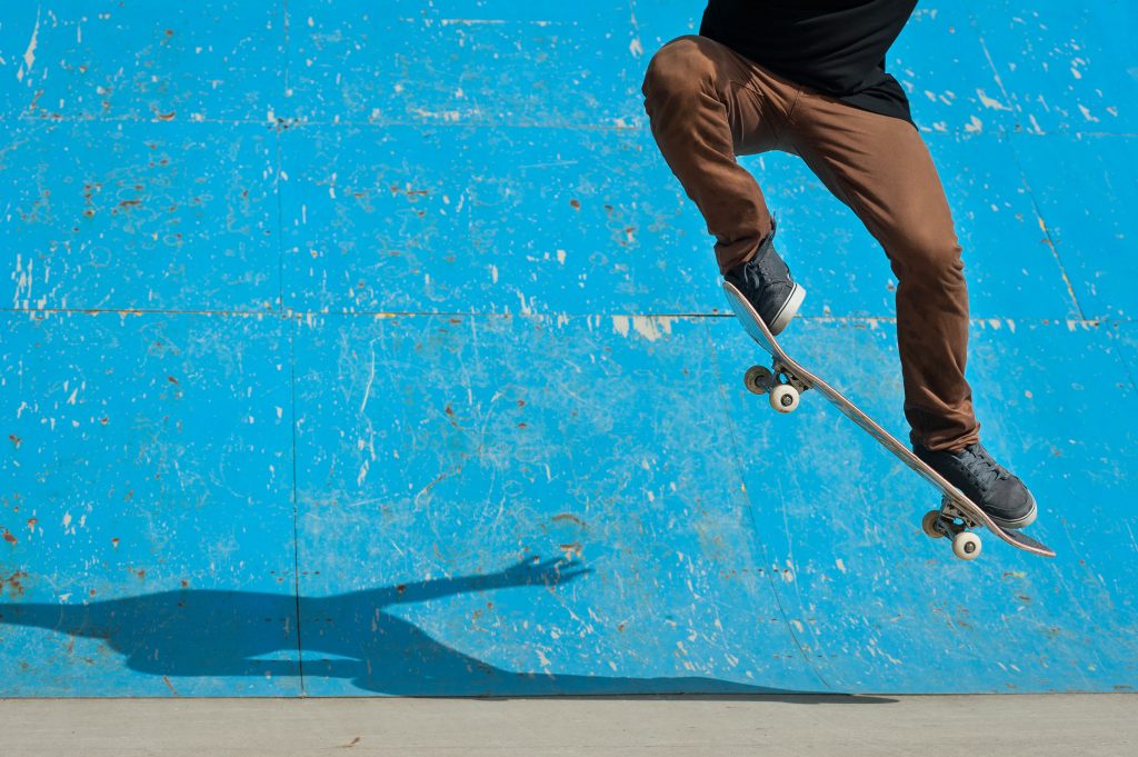 Skateboarder,Doing,A,Skateboard,Trick,-,Ollie,-,At,Skate